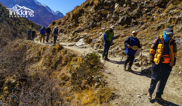 Beginner trekking to Everest Base Camp with mountain views in the Everest region of Nepal.