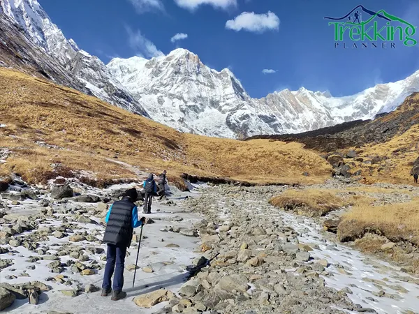 Snow covered Annapurna mountain range with trekking trail in Nepal Himalayas