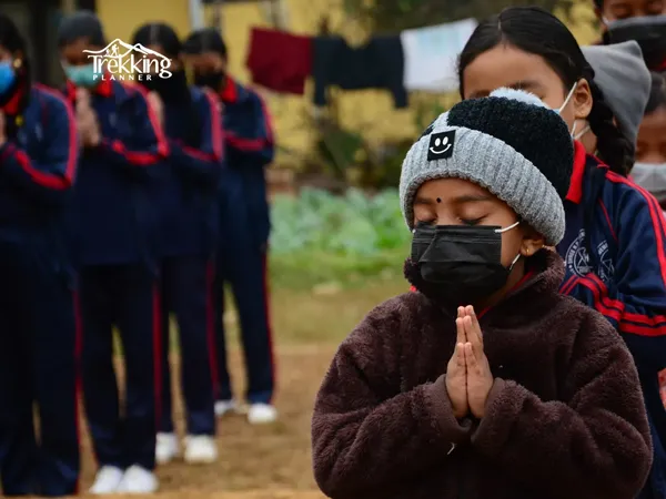 Volunteers helping locals build a community water supply system in a rural village