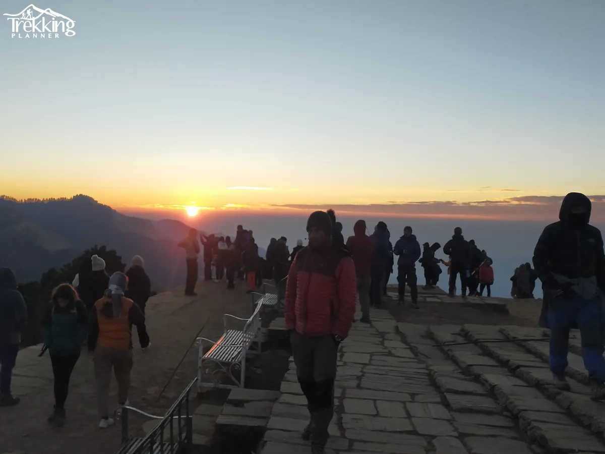 Group of trekkers walking on mountain ridge with panoramic Himalayan view during Annapurna Circuit Short Trek