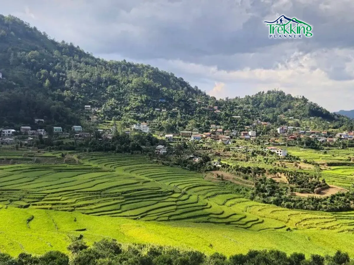 trail-nepal.jpg Hikers walking along the scenic Balthali Village hiking trail surrounded by terraced fields and green hills in Nepal