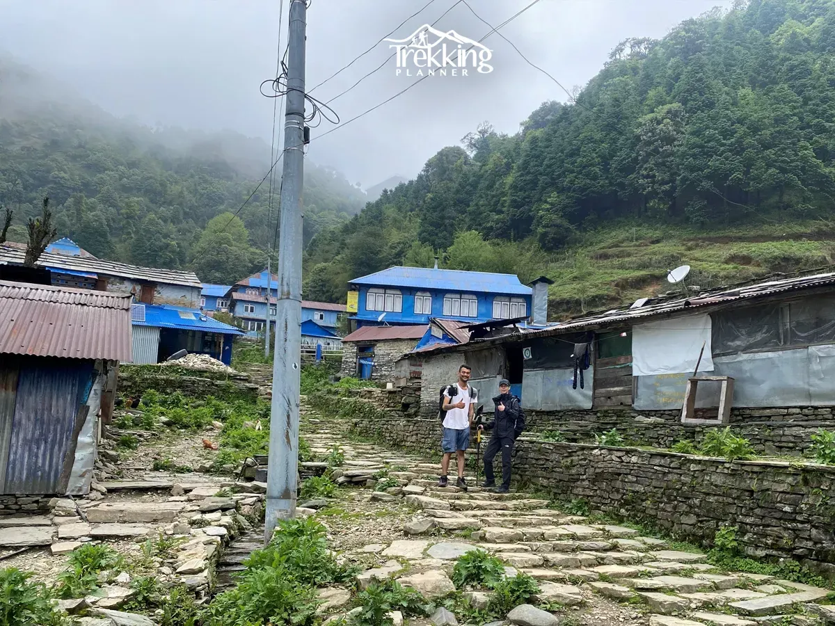 Trekkers walking through Ghorepani Village during the Ghorepani Poon Hill Trek in Nepal