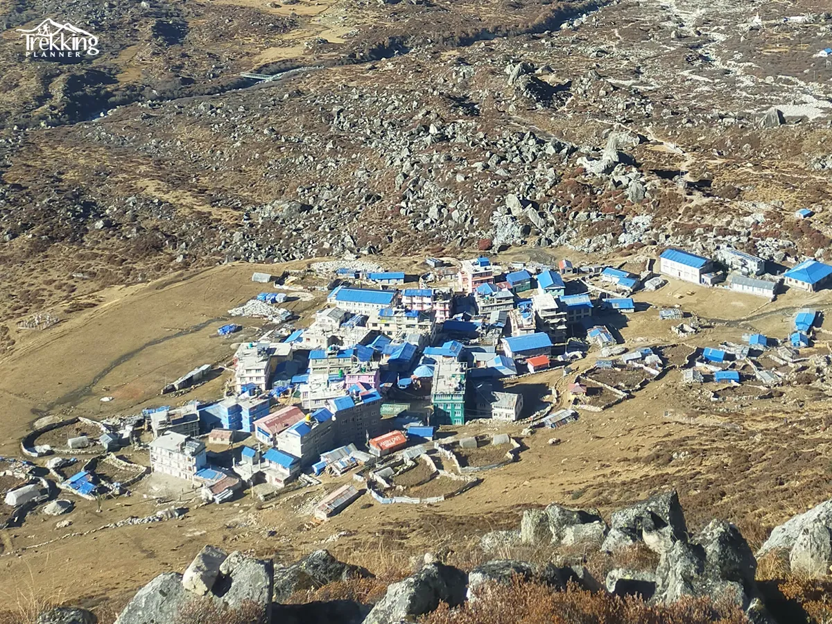 Trekkers walking through traditional Sherpa villages during Helambu Trekking in Nepal
