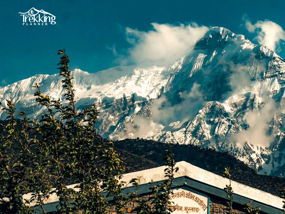 Trekking path between Jomsom and Muktinath with Himalayan mountain backdrop