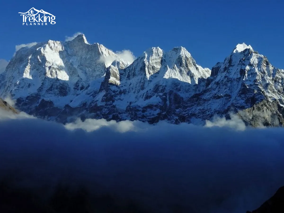 Trekkers walking along remote Himalayan trail during Kanchenjunga North Base Camp