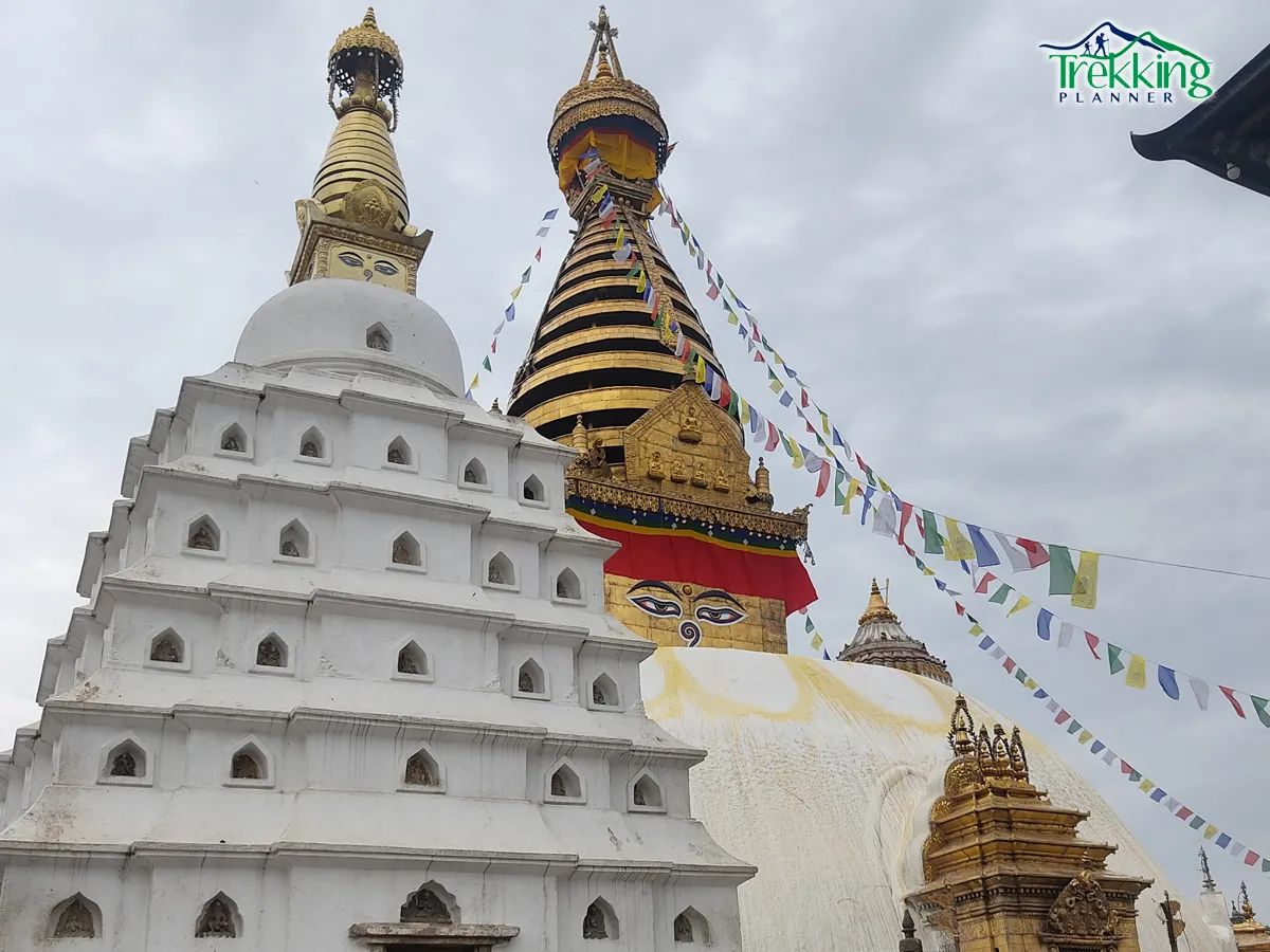 Visitors exploring Swayambhunath Stupa during a Kathmandu City Day Tour in Nepal