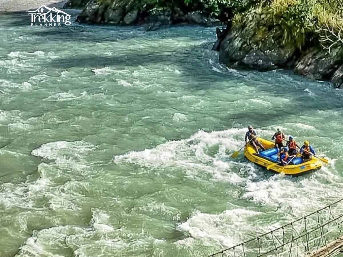 Scenic view of Marshyangdi River valley surrounded by green hills and flowing white water