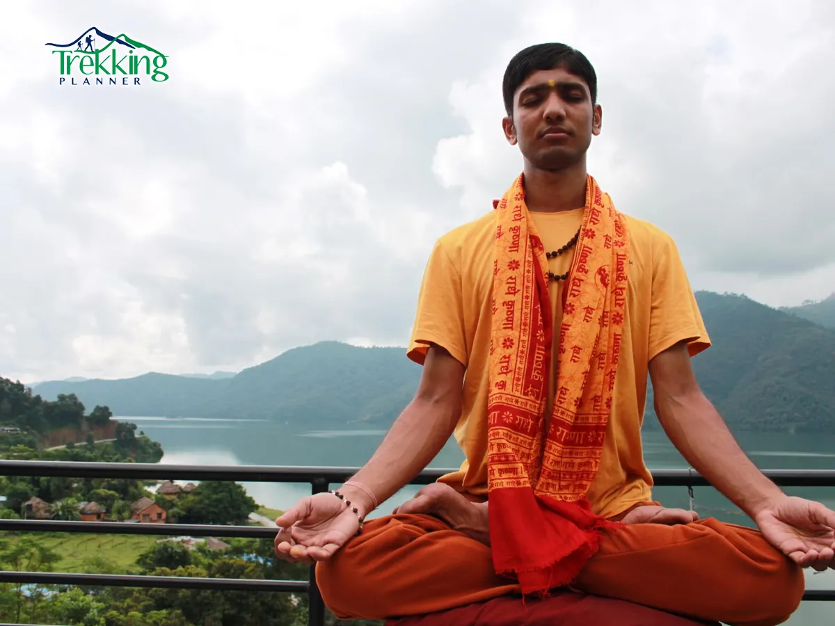 Meditation tour in Nepal featuring group meditation session inside a Buddhist monastery with monks