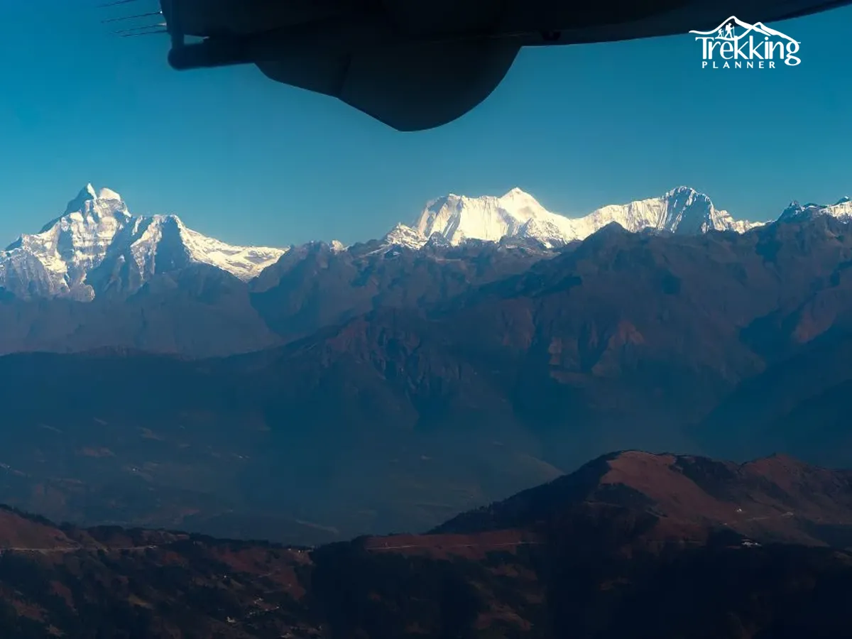 Sunrise view of Mount Everest captured during a mountain flight tour in Nepal.