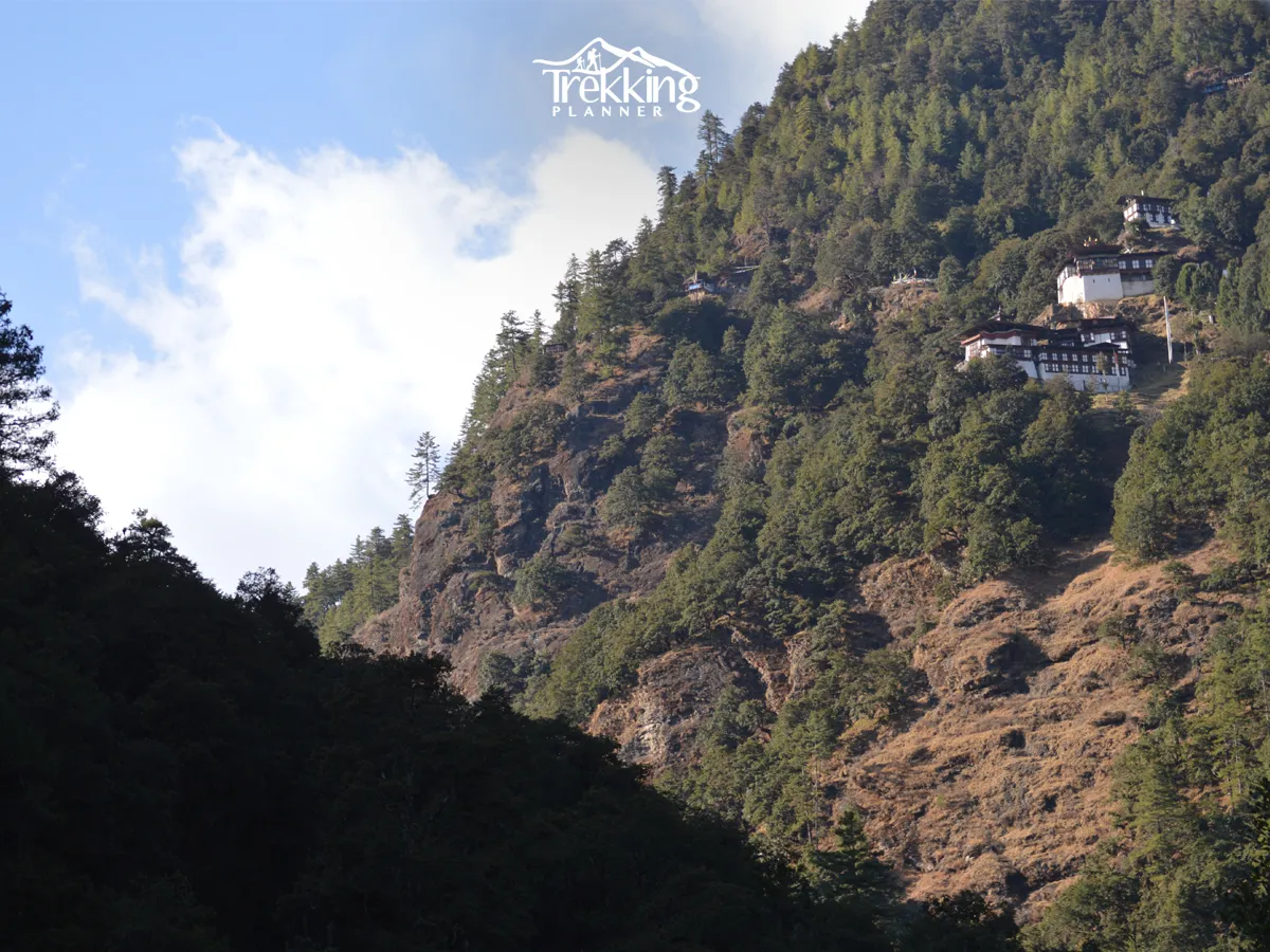 Cliffside monastery overlooking the mountains during a Bhutan Tour