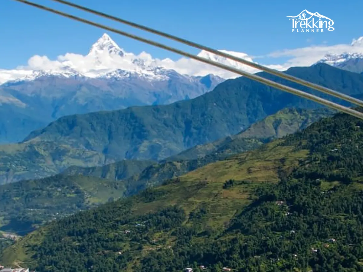 enjoying high-speed zip line in Pokhara Nepal above forest valley