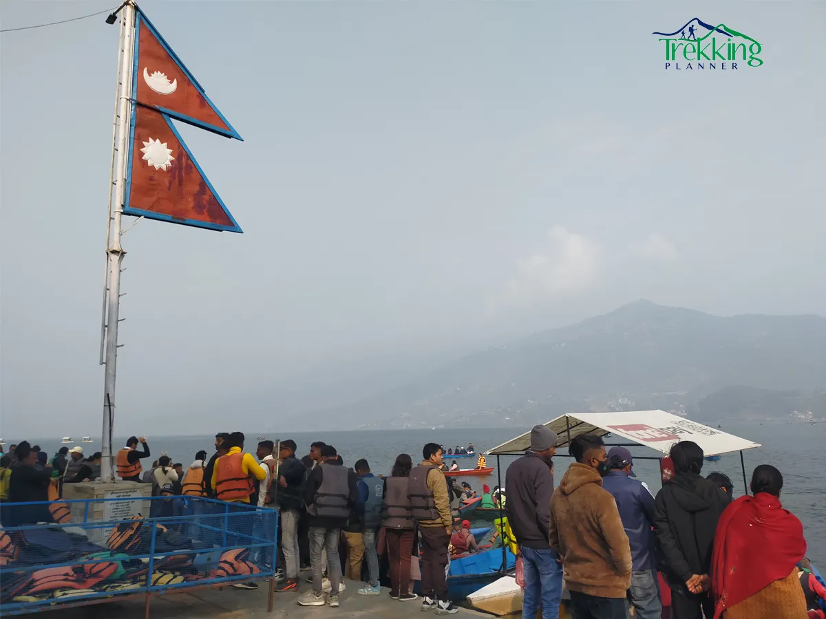 Sarangkot sunrise view overlooking Pokhara city, Phewa Lake, and the Annapurna mountain range during an early morning tour.
