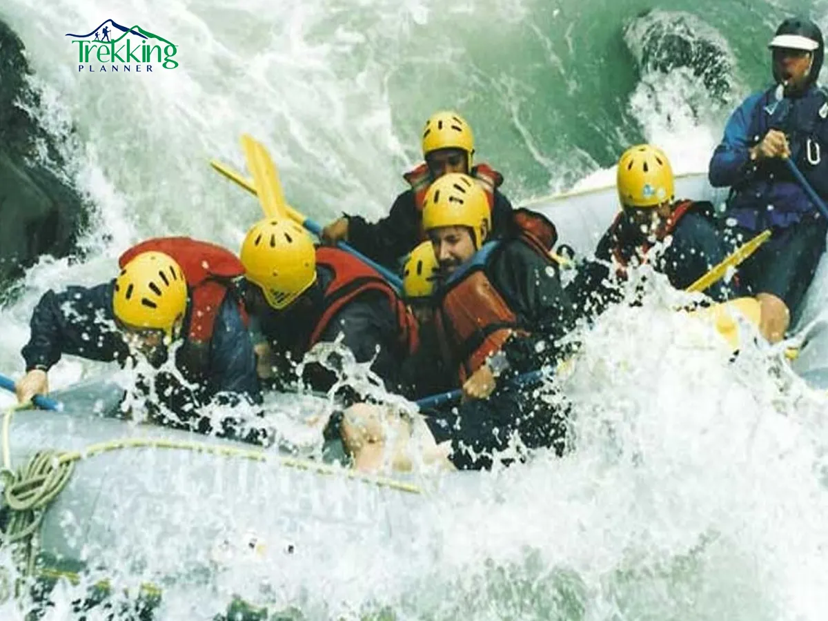 Sunkoshi River rafting adventure in Nepal with white water rapids and safety helmets