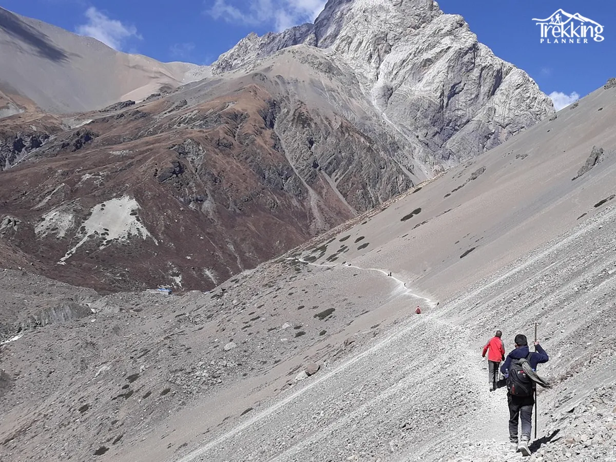 Adventure trekkers crossing Thorong-La Pass on the Tilicho Lake Trek in Nepal