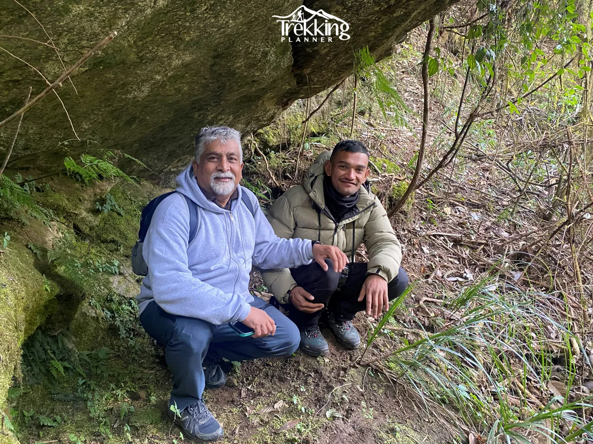 Trekkers resting during the Chisapani Nagarkot Trekking adventure in the forests near Kathmandu.