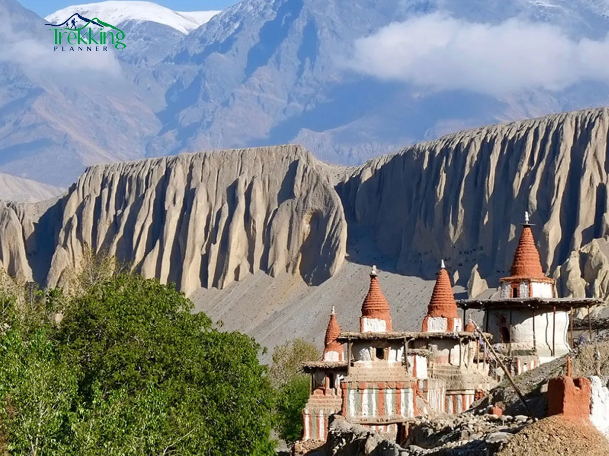 Jeep traveling through Upper Mustang valley during sunset with golden Himalayan peaks in Upper Mustang on a scenic jeep tour