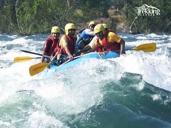 Rafting activity on Kali Gandaki River with stunning Mustang region mountains and desert-like landscape