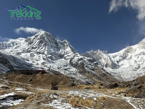 Family trekking together in the Annapurna region enjoying sunrise over the Himalayan mountains