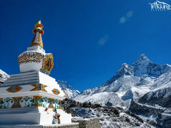 Mountain Stupa Beneath Snowy Peaks