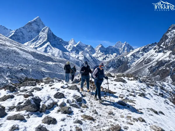 Mountain Trek Through Snowy Peaks