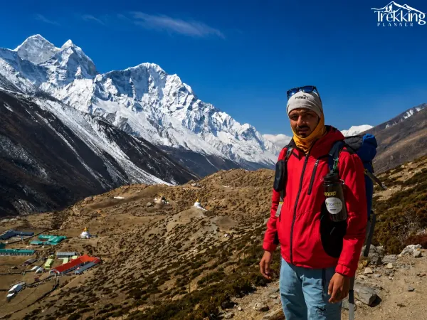 Mountain Trekker Overlooking Himalayan Peaks