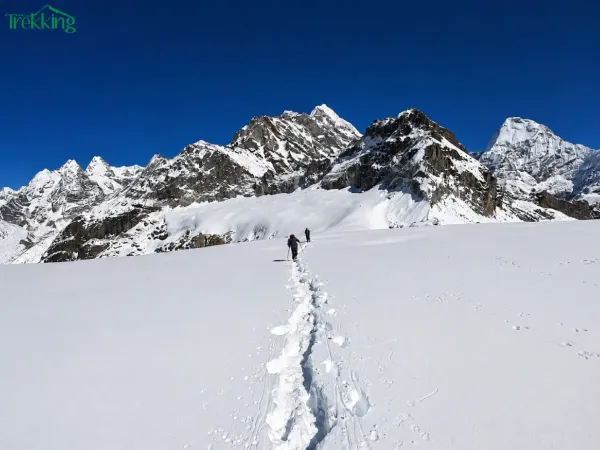 Snow Trail To The Alpine Peaks