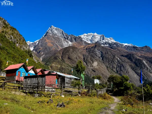 Snowy Peaks Over A Mountain Village