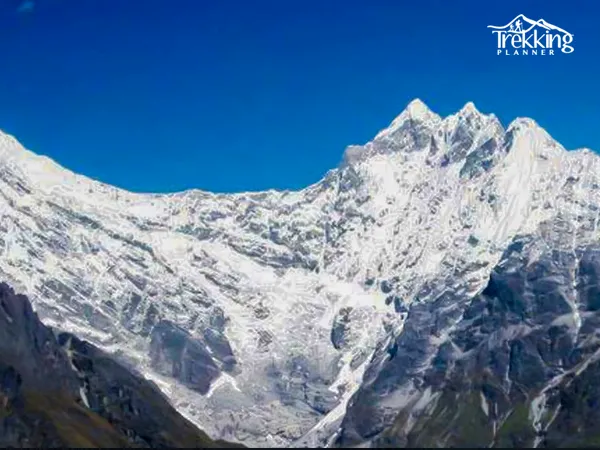 Traditional Himalayan village with local houses and mountain backdrop along Ganesh Himal trekking route