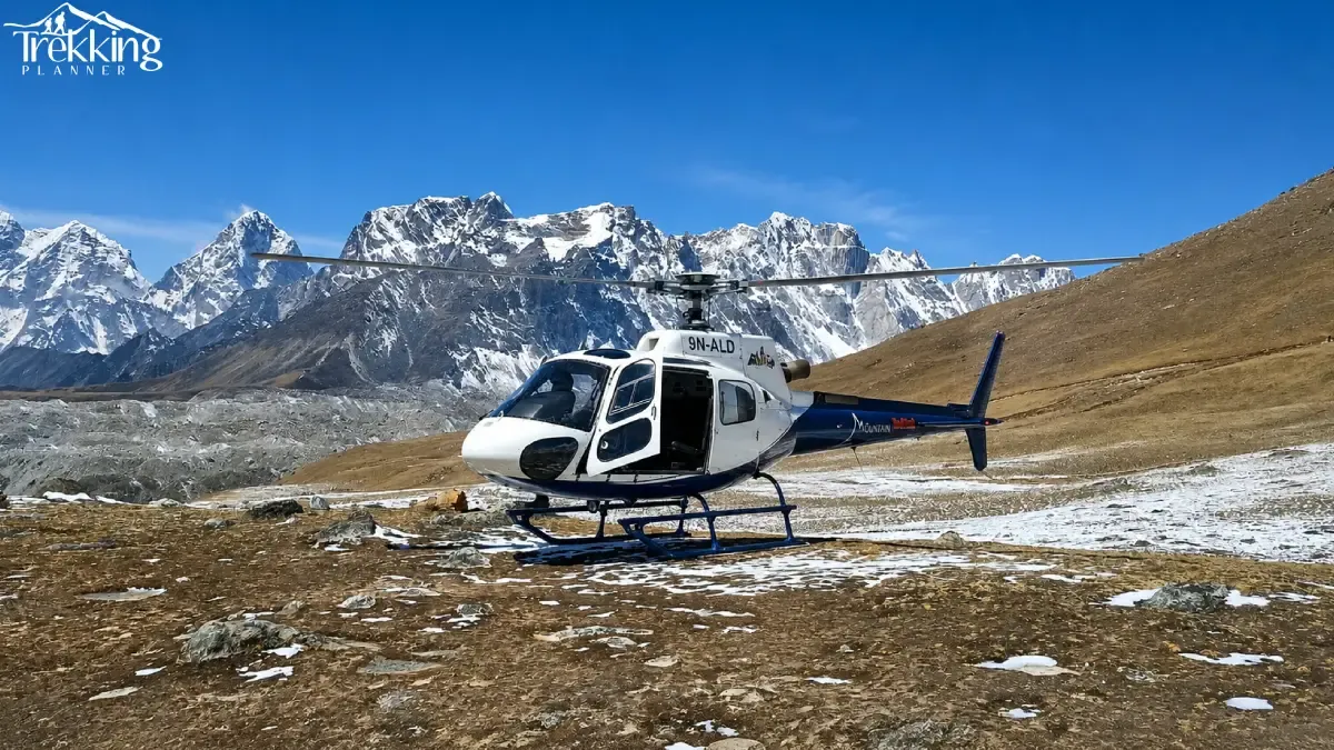 mountain-helicopter-above-snowy-peaks