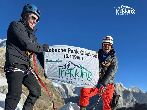 Climbers ascending Lobuche Peak with ropes and icy terrain during a Himalayan expedition