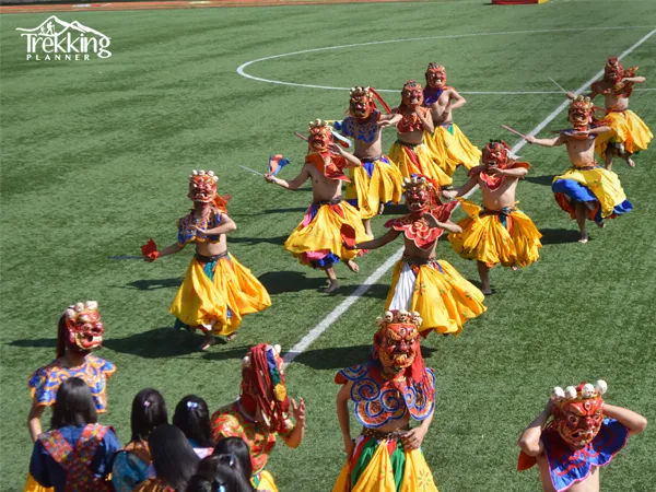 Sacred masked dancers performing Cham dance during the Tshechu Festival in Bhutan.