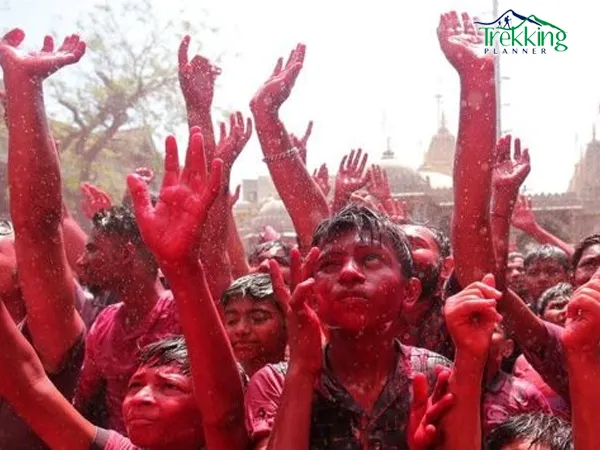 Holi festival celebration at Basantapur Durbar Square Nepal with colored powder smoke and dancing crowd