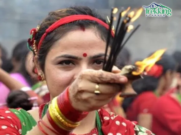 Women praying and fasting at Pashupatinath Temple during Teej festival in Nepal