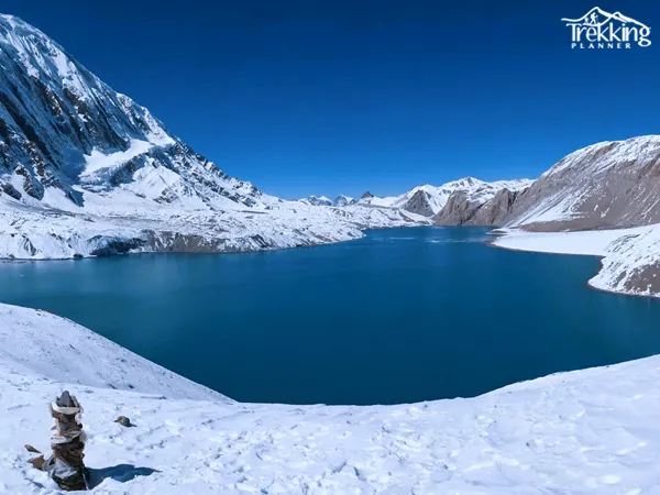 Stunning panoramic view of Tilicho Lake along the Thorong-La trekking route in Nepal