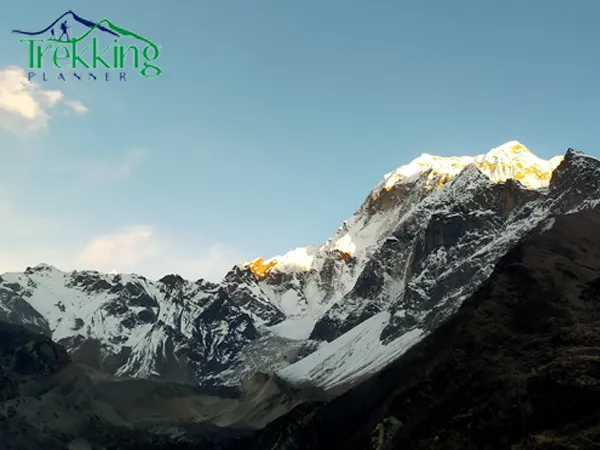 Trekkers walking through the scenic Tsum Valley and Manaslu Circuit Trek route in the Nepal Himalayas.